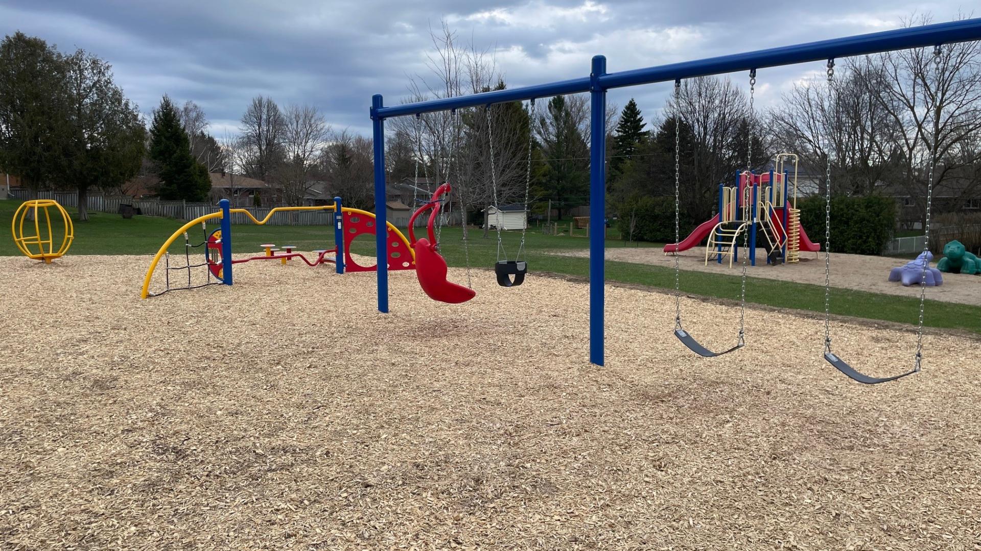 Playground equipment with swing set