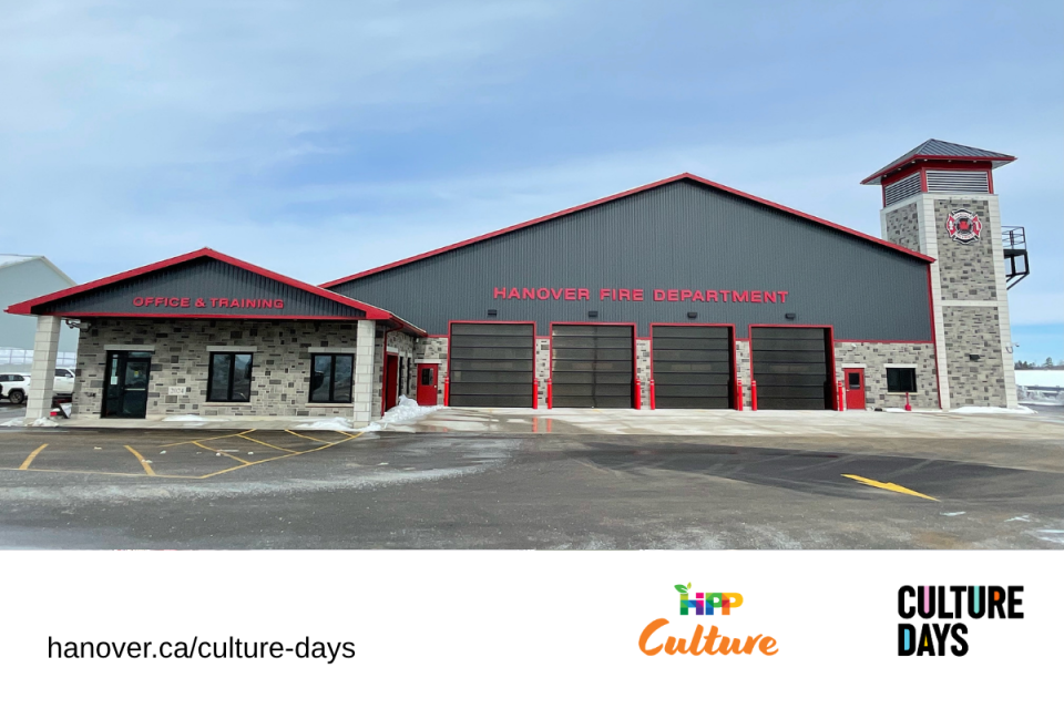 A new firehall building made of brick and red and black accents