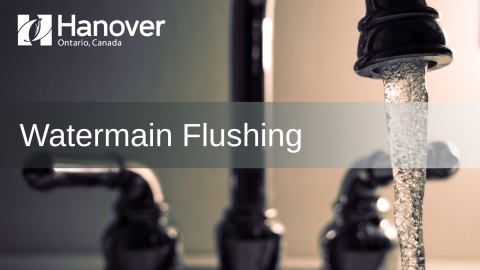 Watermain flushing text over a sink tap with white Town of Hanover logo in top left corner